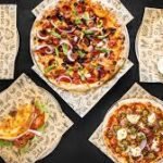 Fast-Casual Pizza Comes to Hapeville: Discover the Your Pie Difference When you think of Pizza Hapeville Georgia, what comes to mind? Maybe it’s the comforting aroma of hand-tossed dough baking to perfection, the tangy sweetness of a family recipe marinara, or the warm, welcoming vibe of a neighborhood spot that feels like home. Now, Hapeville has a pizza destination that checks all those boxes and more—Your Pie, the original fast-casual pizza brand, has arrived, bringing its signature made-to-order pizzas, local hospitality, and Georgia pride to the community. Whether you’re a local resident or just visiting, Your Pie offers a dining experience that combines high-quality ingredients with speed, customization, and a family-friendly atmosphere. Let’s explore what makes this fast-casual pizza concept stand out and why it’s quickly becoming a favorite in Hapeville, GA. A Fresh Take on Pizza in Hapeville, Georgia Hapeville is known for its vibrant community, eclectic food scene, and Southern charm. Adding a fast-casual pizza restaurant like Your Pie to the mix means locals and visitors now have a place to enjoy restaurant-quality pizza without the wait. Unlike traditional pizza spots, Your Pie gives you the opportunity to customize every aspect of your meal—from dough type and sauces to cheeses and toppings—ensuring that every bite is uniquely yours. Your Pie’s commitment to freshness is clear the moment you step inside. The hand-tossed dough is made daily, their marinara sauce comes from a generations-old Italian family recipe, and every topping is carefully selected for maximum flavor. If you’ve been searching for Pizza Hapeville Georgia, this new spot offers a dining experience that blends convenience with authenticity. The Fast-Casual Pizza Revolution The term “fast-casual” has become a buzzword in the restaurant industry, but what does it really mean? At Your Pie, fast-casual isn’t just about getting your food quickly; it’s about quality without compromise. Guests can watch their pizza being assembled and baked in a brick oven right in front of them, ensuring every pie is hot, fresh, and made-to-order in minutes. This model also allows guests to experiment. Whether you’re craving a classic Margherita, a hearty meat-lover’s pizza, or a creative veggie-loaded masterpiece, Your Pie makes it simple to try something new every time you visit. For those who love pizza but want lighter options, Your Pie also offers salads, paninis, gelato, and craft beer, giving everyone at the table something to enjoy. Customization That Celebrates Local Flavor What sets Your Pie apart from other pizza chains is its focus on local community and customization. Each location is encouraged to integrate local flavor into its offerings, including craft beer from nearby breweries and toppings that reflect regional tastes. Hapeville guests will find the same warm hospitality that Georgia is known for, along with a chance to enjoy a meal that feels both familiar and elevated. This commitment to community extends beyond the menu. Your Pie locations are locally owned and operated, which means the team behind the counter is deeply invested in serving the people of Hapeville. Whether you’re a frequent diner or stopping by for the first time, you’ll be greeted with friendly faces, personalized service, and that unmistakable Southern charm. Perfect for Families, Friends, and Foodies Your Pie isn’t just a place to grab a quick bite; it’s a gathering spot for families, friends, and food enthusiasts. The relaxed atmosphere makes it perfect for kids, while the customizable menu means picky eaters can always find something they’ll love. For adults, the curated selection of local craft beer and wine pairs perfectly with their artisan pizzas, making it a great place to unwind after work or enjoy a night out. And for foodies, the ability to design your own pizza from a wide selection of ingredients is a dream come true. Pair that with their creamy gelato for dessert, and you have a full dining experience that rivals any sit-down restaurant—without the long wait times. Supporting Local Businesses in Hapeville By choosing Your Pie, Hapeville residents aren’t just getting delicious pizza—they’re supporting a locally owned business that reinvests in the community. Your Pie’s franchise model encourages owners to get involved in local events, partner with local suppliers, and create meaningful connections with their guests. Hapeville’s reputation as a growing hub for art, culture, and dining is further elevated by having a brand that values authenticity and community engagement. When you search for Pizza in Hapeville, Georgia, you’re not just finding a meal; you’re discovering a business that cares about creating a positive local impact. Why Hapeville is the Perfect Match for Your Pie Hapeville’s charm lies in its unique blend of history, diversity, and small-town warmth. Located just minutes from downtown Atlanta, this close-knit community is known for welcoming travelers and residents alike. Adding a fast-casual pizza restaurant like Your Pie fits perfectly with Hapeville’s identity as a place where Southern hospitality meets modern innovation. Your Pie’s arrival in Hapeville offers locals a new go-to pizza spot that blends Italian tradition, Georgia roots, and a focus on quality. With handcrafted pizzas, customizable menu options, and a commitment to outstanding service, Your Pie is set to become a staple of the Hapeville dining scene. A Pizza Experience Worth Sharing In the age of social media, food has become more than just a meal; it’s an experience worth sharing. Your Pie’s visually stunning pizzas, rustic brick-oven cooking, and vibrant interiors make it a perfect spot for Instagram-worthy photos. Whether you’re capturing the bubbling cheese on your pizza, a refreshing pint of local craft beer, or a moment with friends, Your Pie delivers a dining experience that’s as photogenic as it is flavorful. Conclusion: Your New Pizza Destination in Hapeville If you’ve been searching for Pizza Hapeville Georgia, look no further than Your Pie. This fast-casual concept redefines what it means to grab a quick bite, offering handcrafted pizzas, locally inspired flavors, and a warm atmosphere where everyone feels welcome. Your Pie is more than just a restaurant; it’s a community-driven brand that values quality ingredients, exceptional service, and authentic connections. Whether you’re a longtime pizza lover or a first-time visitor, Your Pie promises a dining experience that will keep you coming back for more. So, the next time you’re in Hapeville, stop by and discover the Your Pie difference—because great pizza, warm hospitality, and local flavor are always worth the trip.